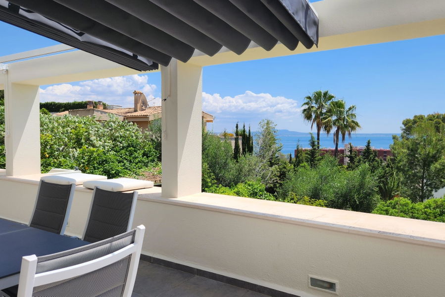 Fantastische Wohnung mit Meerblick und Garten in Cas Catalá