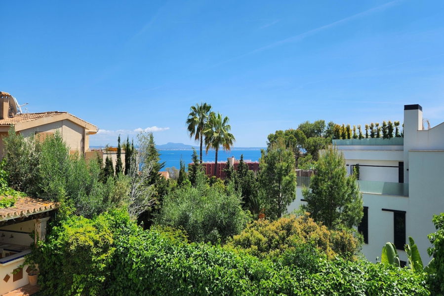 Fantastische Wohnung mit Meerblick und Garten in Cas Catalá