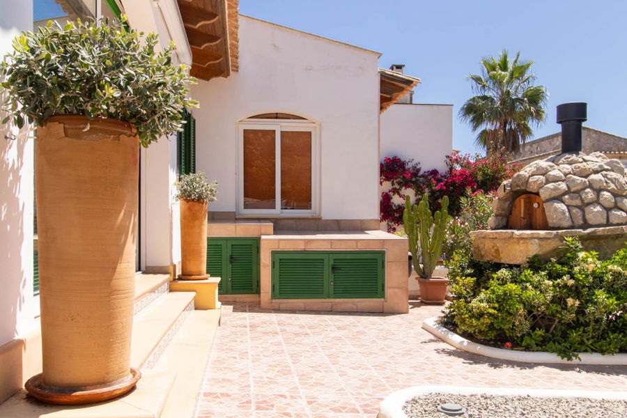 Doppelhaushälfte mit Garten, Terrassen und Gemeinschaftspool in Sa Rapita