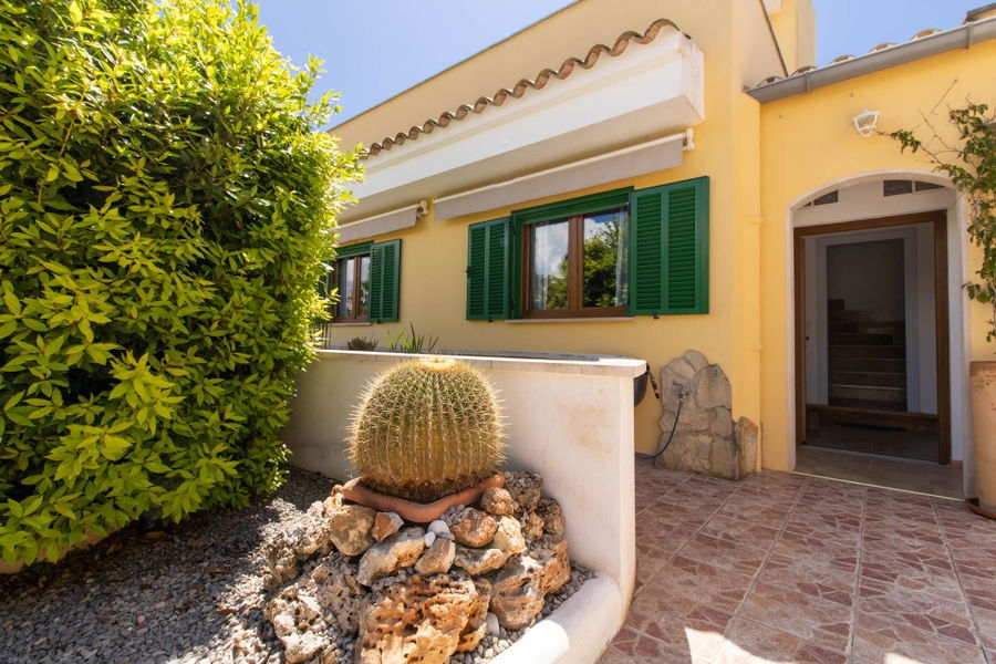 Doppelhaushälfte mit Garten, Terrassen und Gemeinschaftspool in Sa Rapita