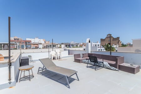Semi-detached house with patio and roof terrace in second sea line Portixol